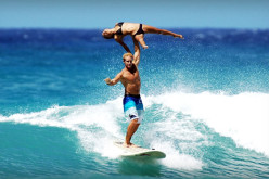 Two Gymnasts Pull Off Incredible Stunts in Surfing Competition