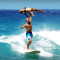 Two Gymnasts Pull Off Incredible Stunts in Surfing Competition