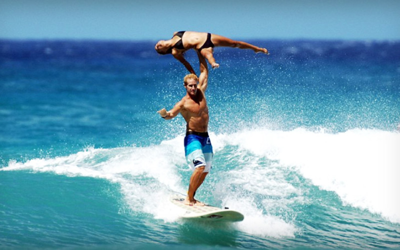 Two Gymnasts Pull Off Incredible Stunts in Surfing Competition